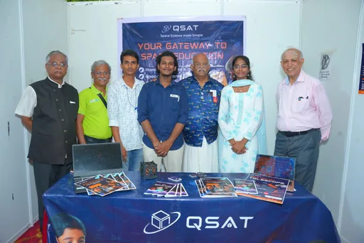 The QSAT team at their space education exhibition booth